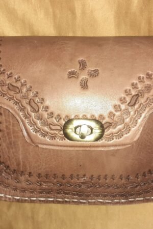 Bolso trapecio labrado click