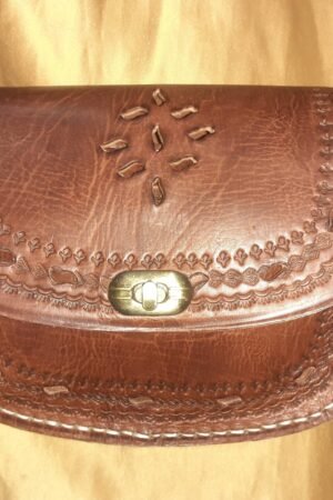 Bolso redondo labrado click