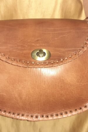 Bolso redondo vacuno asa click