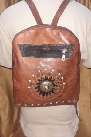 Mochila colegial sol piedra de colores