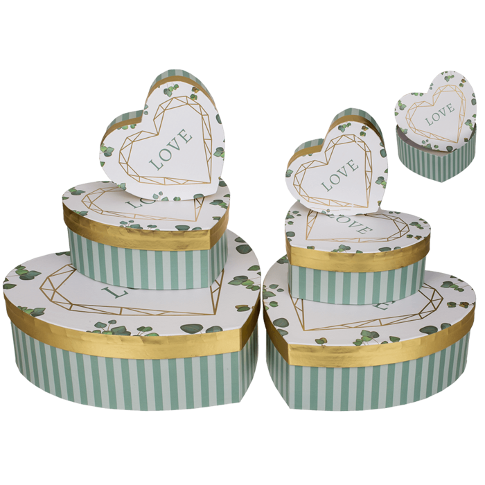 White/green colored present box in heart shape,