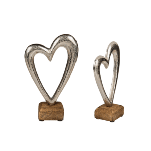Metal heart on wooden base,