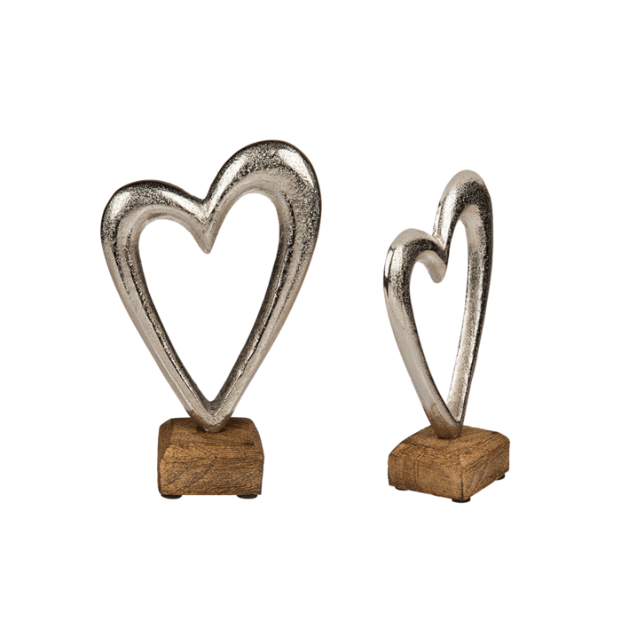 Metal heart on wooden base,
